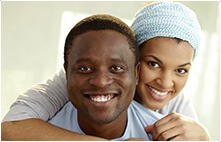 Man and woman with healthy smile after general dentistry