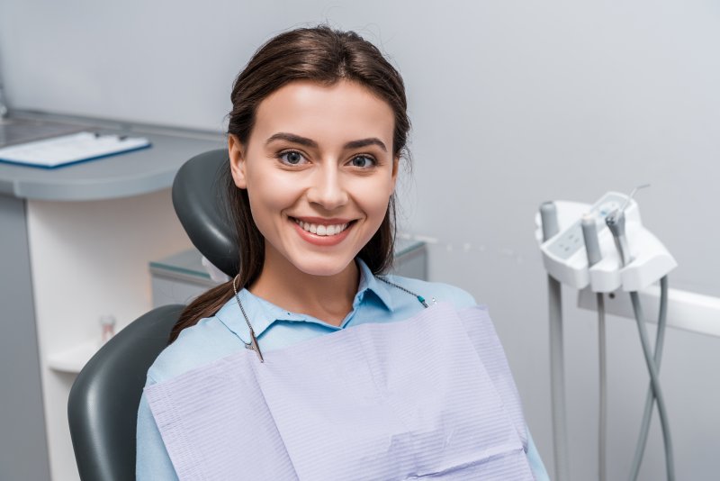 A beautiful woman smiling in a dental clinic